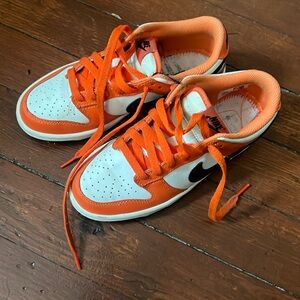 Orange, white and black dunks kids size 4
